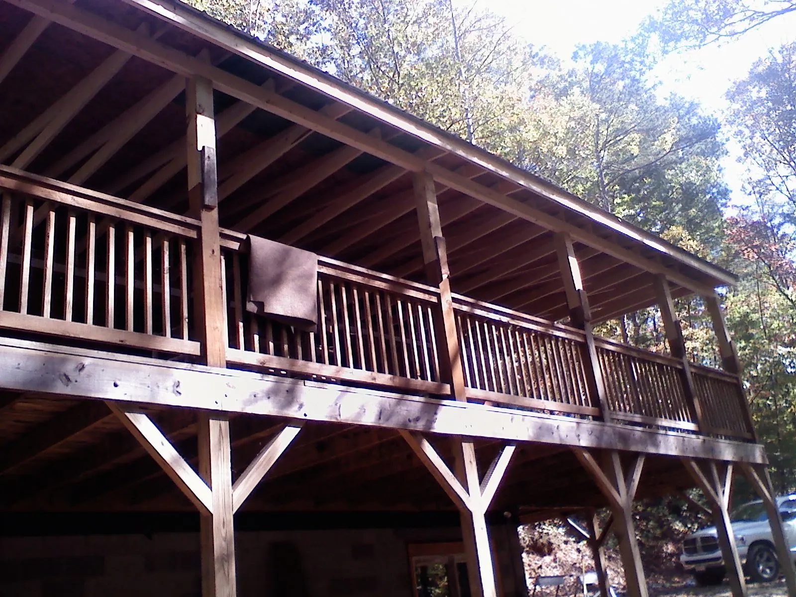 Timber framing under a new elevated porch and deck — Roof Leak Repair in Newburyport by Roofing Brothers